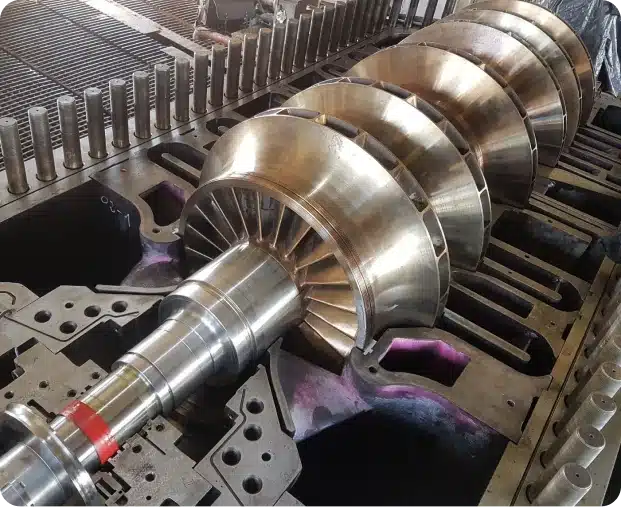 An image shows turbocharger shafts and blades under repair at Majestic Engineering.